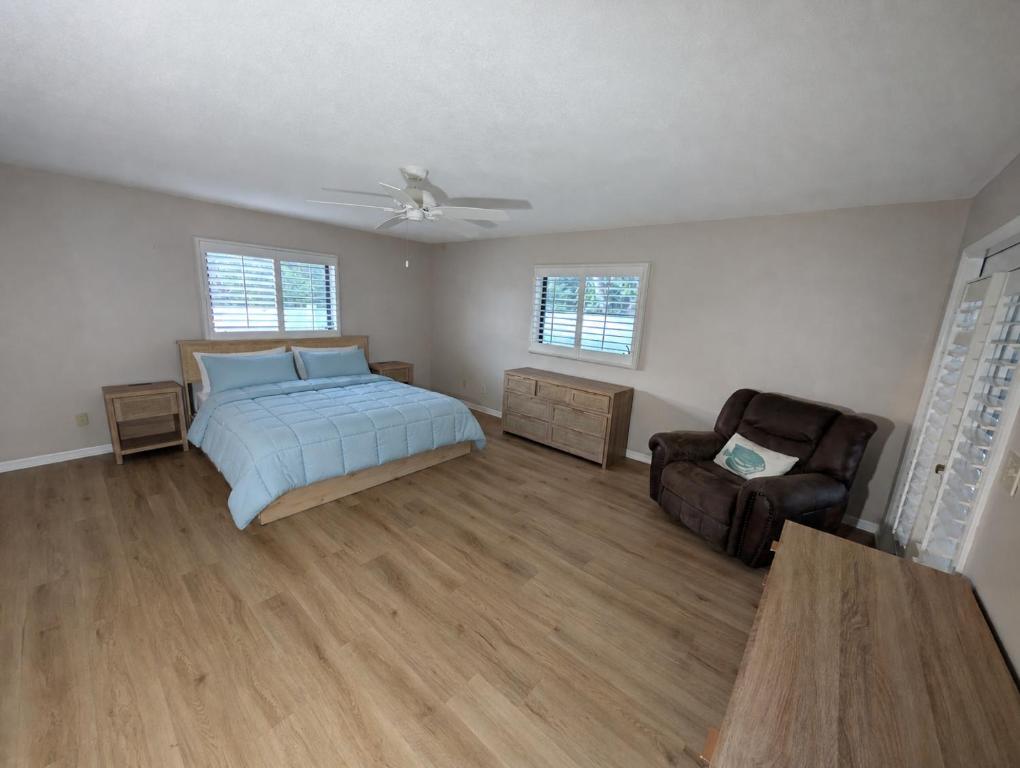 Primary bedroom at Palm Harbor Coastal Cottage